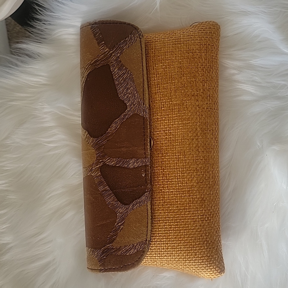 Handmade woven giraffe print clutch